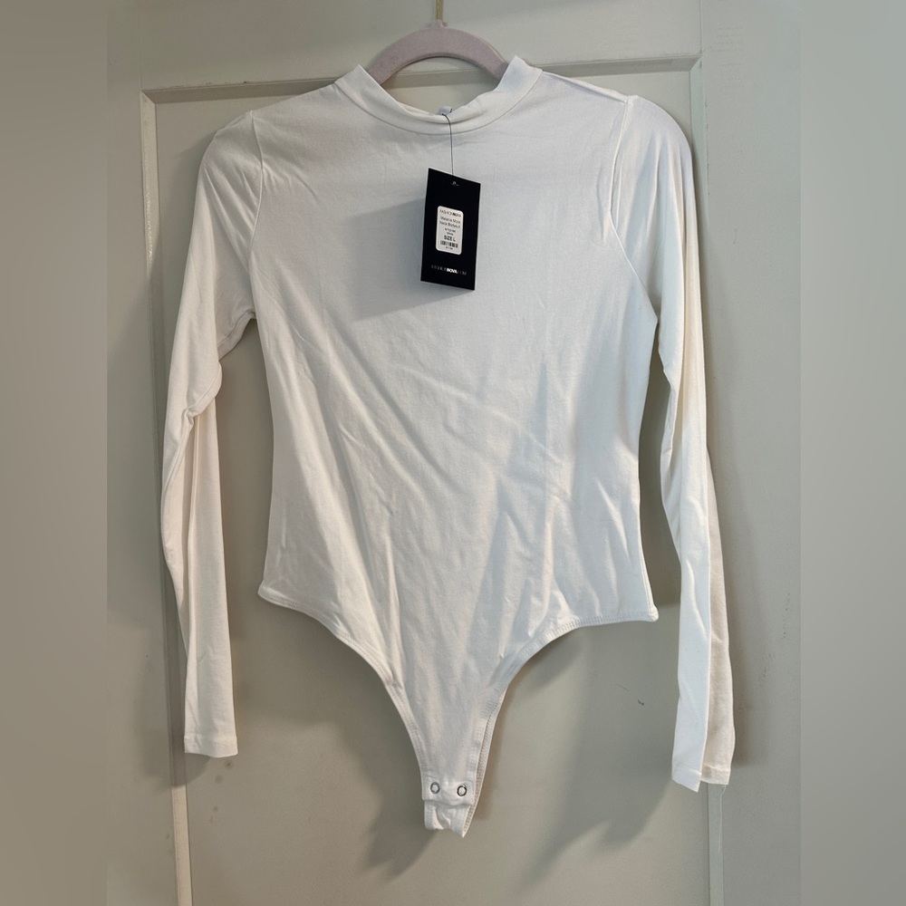 Unworn White FashionNova body suit - size Large